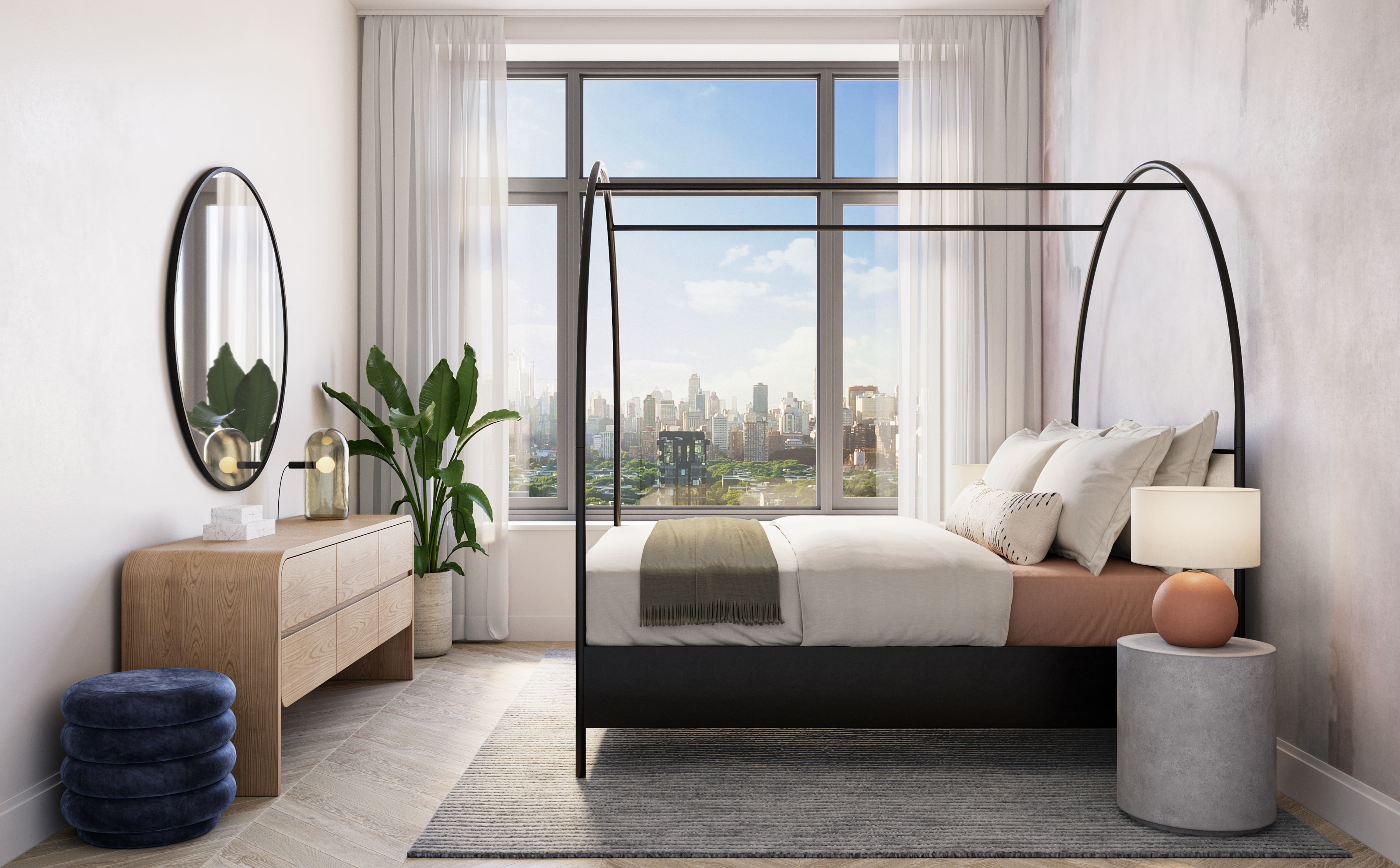 Light filled master bedroom in NOVA condos overlooking LIC New York. Bed and bedside table in front of dresser and mirror.